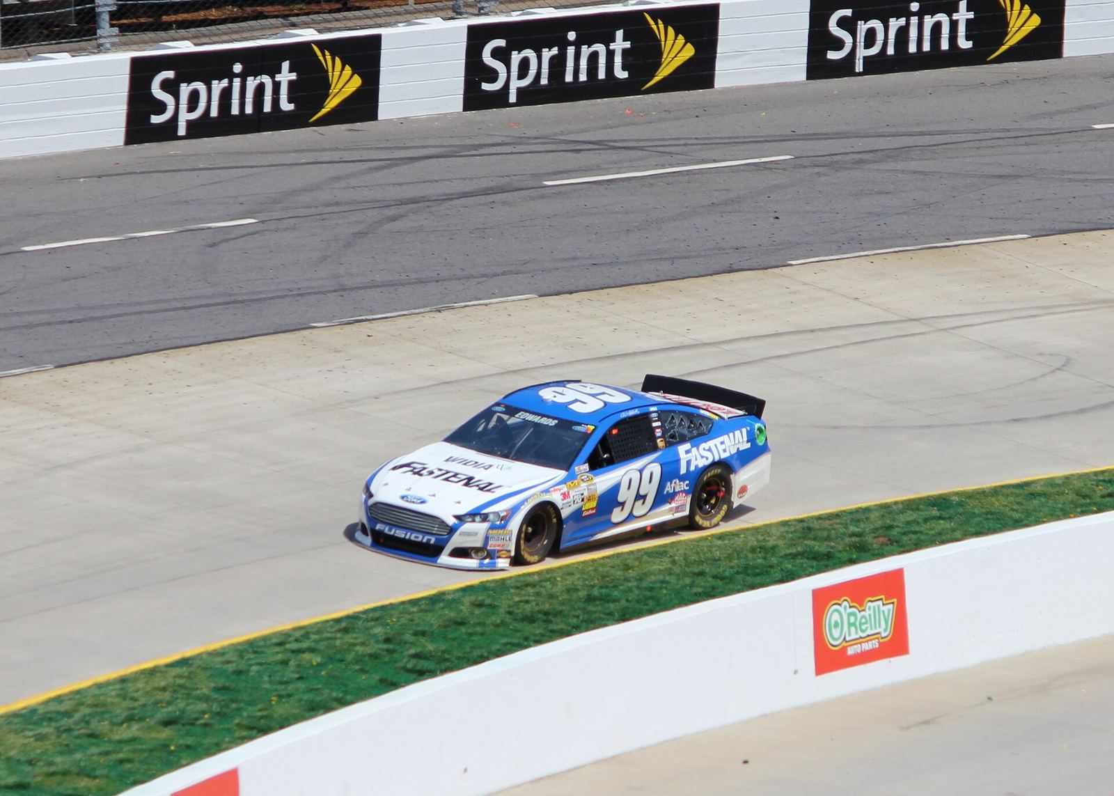 Carl Edwards's blue and white No. 99 Fastenal Ford on track at Martinsville